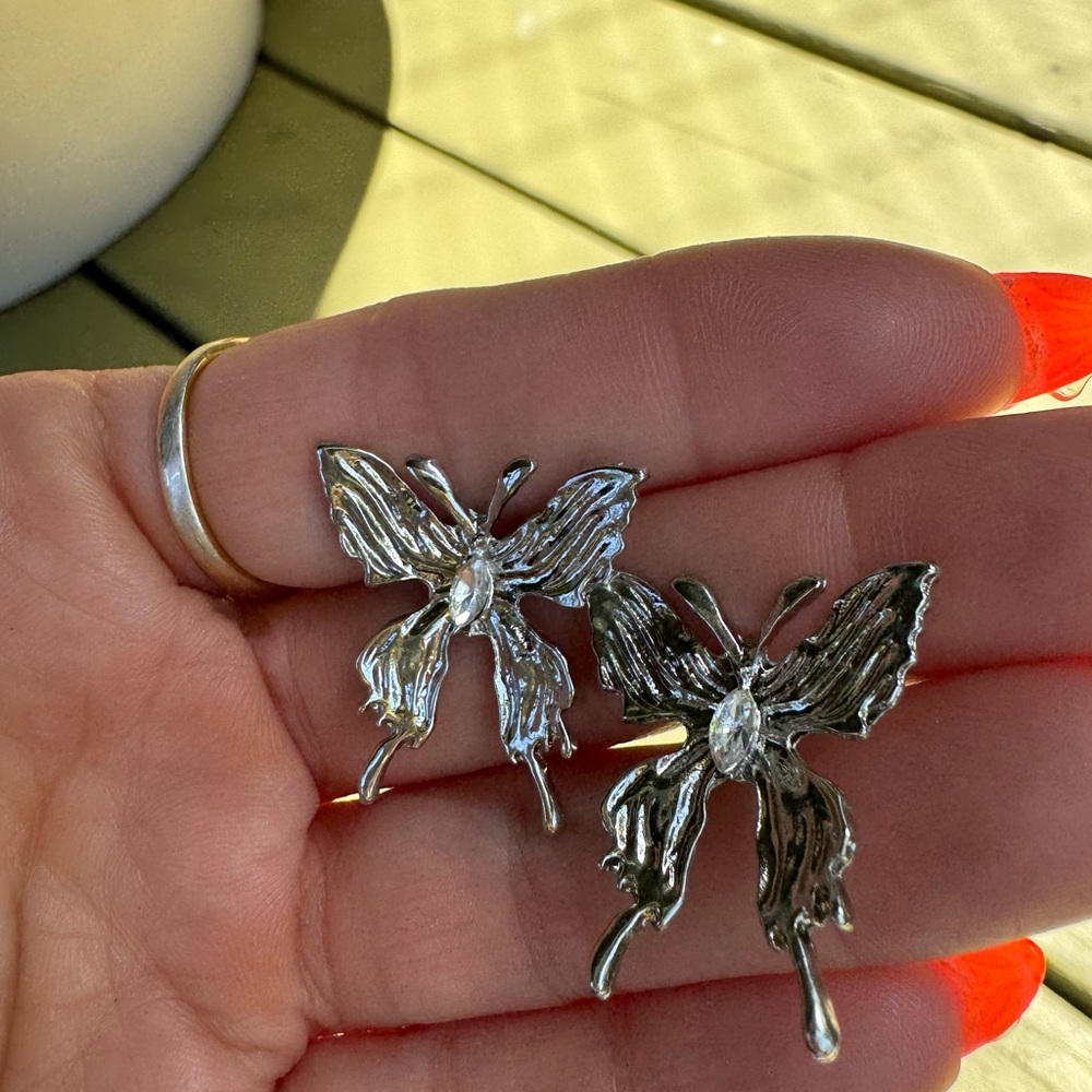 Silver toned butterfly earrings with clear gemstone NEW